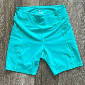Turquoise biker shorts with pockets